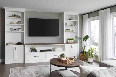 Built-in entertainment system in Markham living room renovation with mounted TV