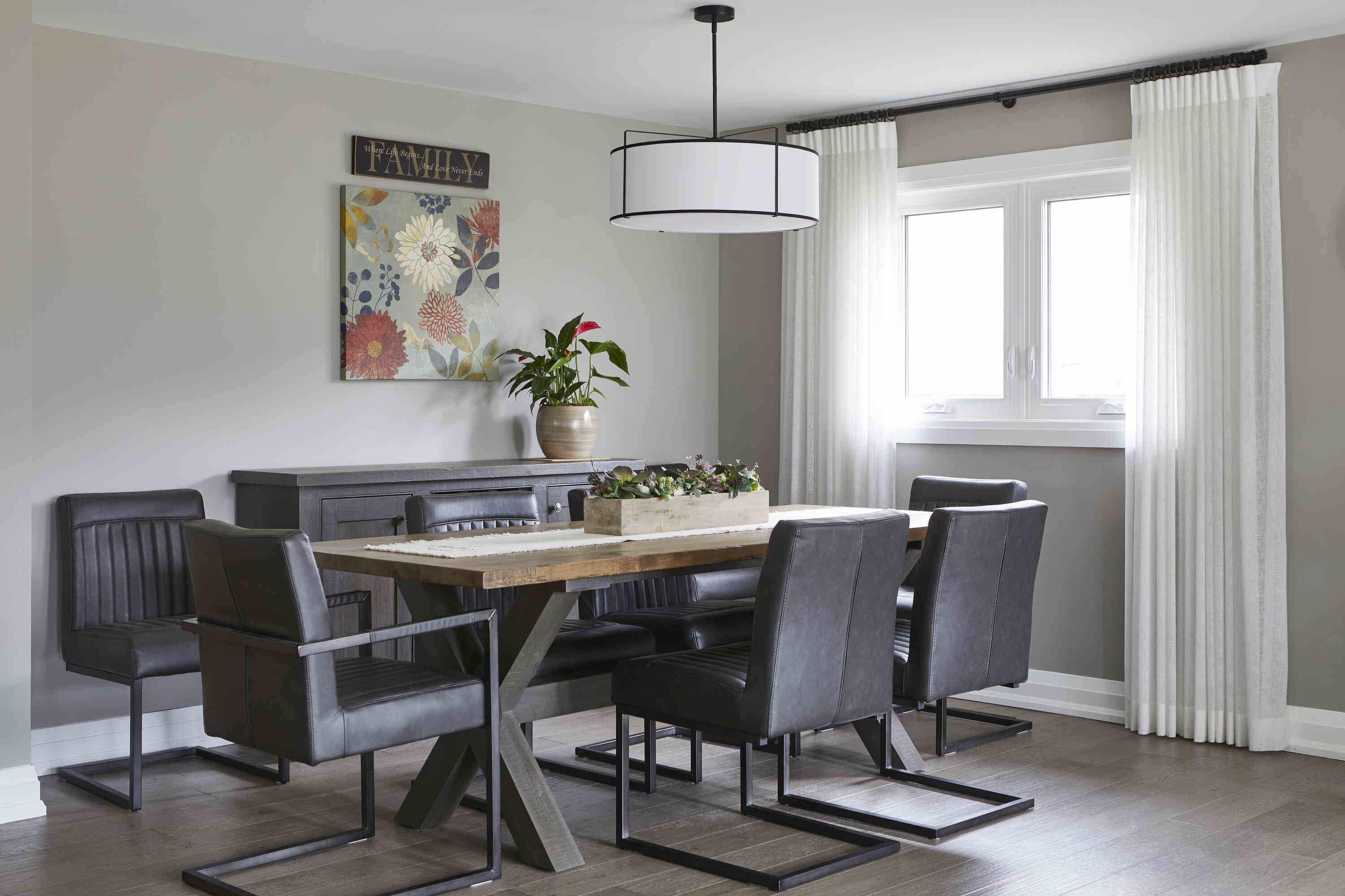 Dining room area in Markham home renovation near window with drapes