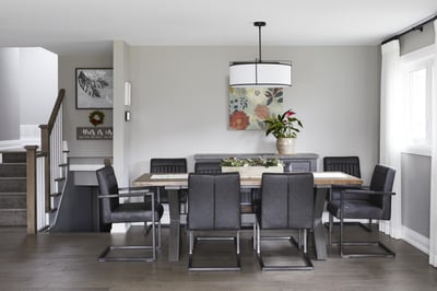 Dining room in Markham renovation with hanging light fixture above