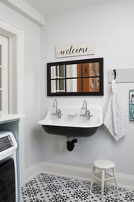 Floating black and white sink in laundry room (1)