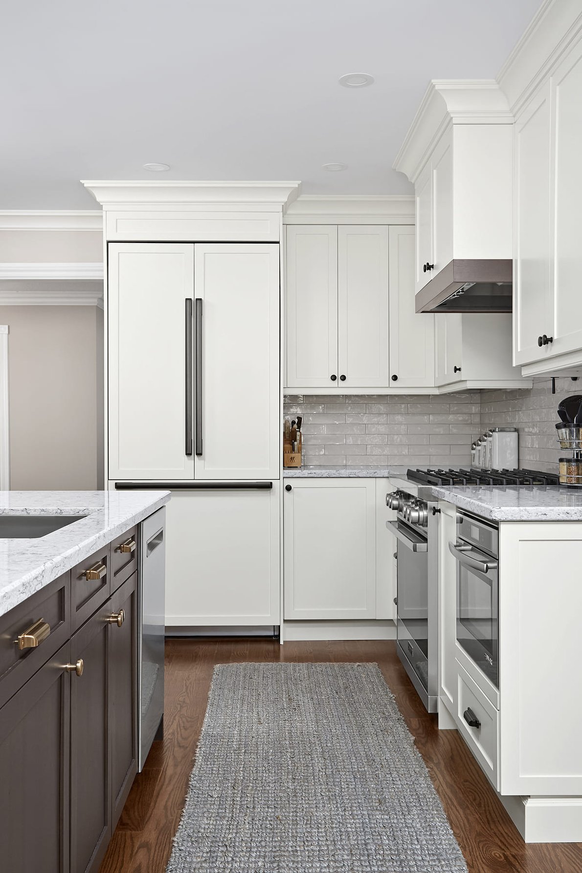 Luxury kitchen renovation in Markham with refrigerator, stove, and sink in triangular format