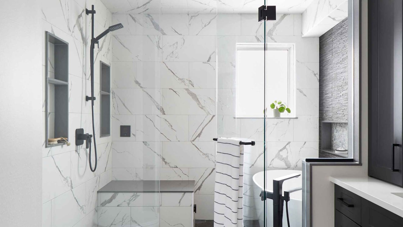Newly Renovated Walk-In Shower and Tub Combo With Built-in Bench and Window