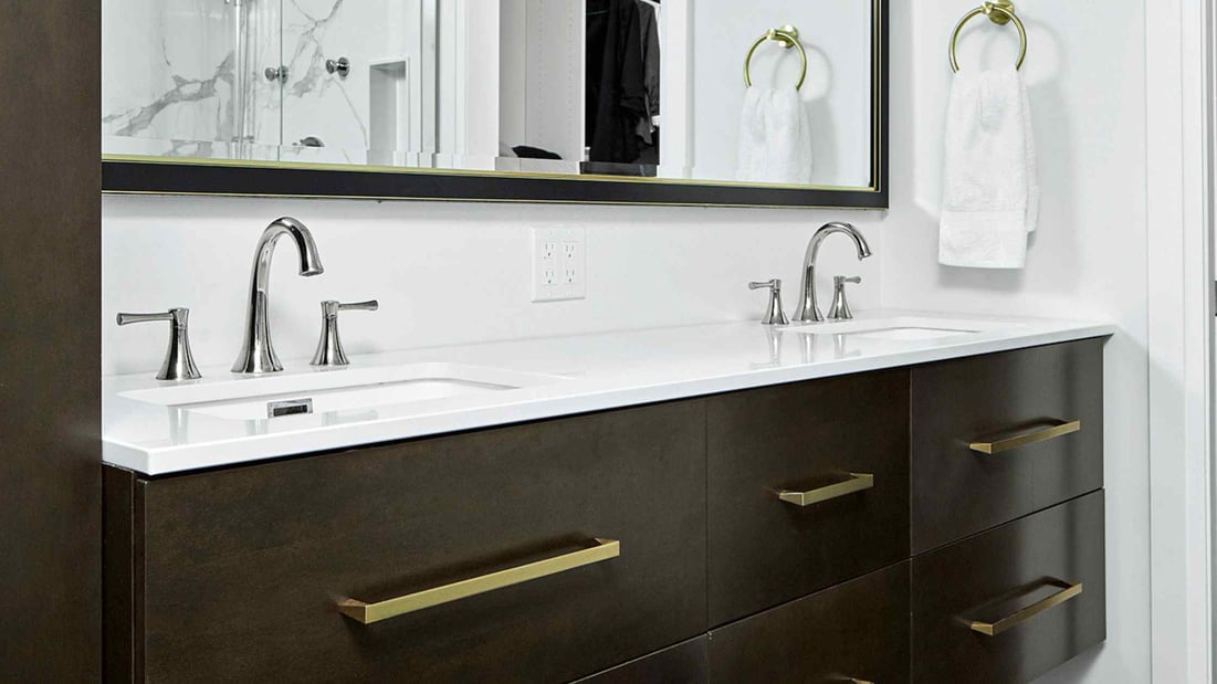 Double Bathroom Vanity Renovation. Two Rows of Six Drawers Beneath the Sinks and a Large Rectangular Mirror Above