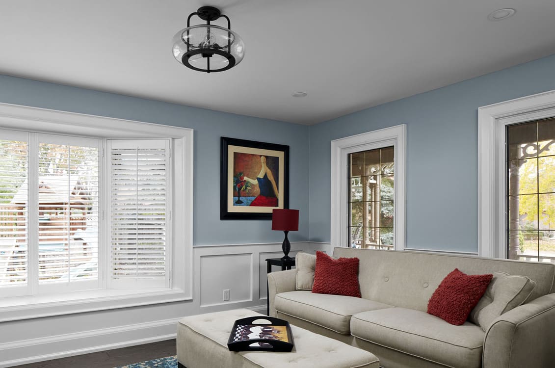 Living room renovation with bow windows