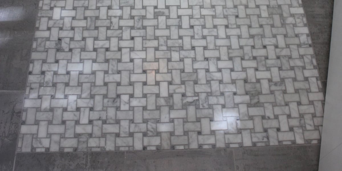 Basketweave tile flooring in bathroom renovation