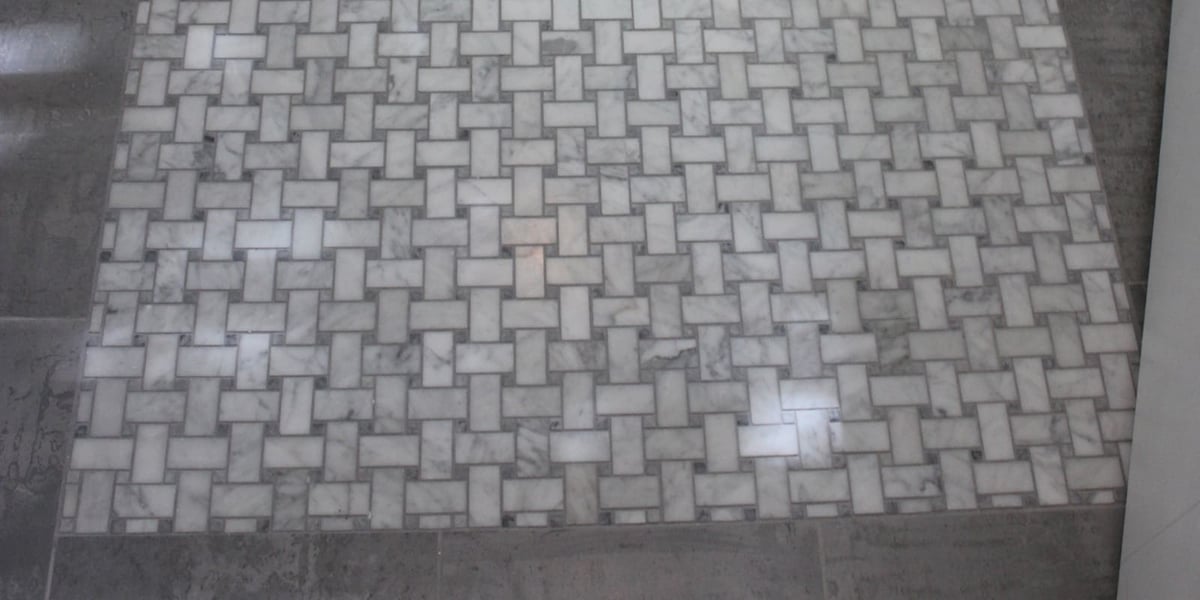 Basketweave tile flooring in bathroom renovation