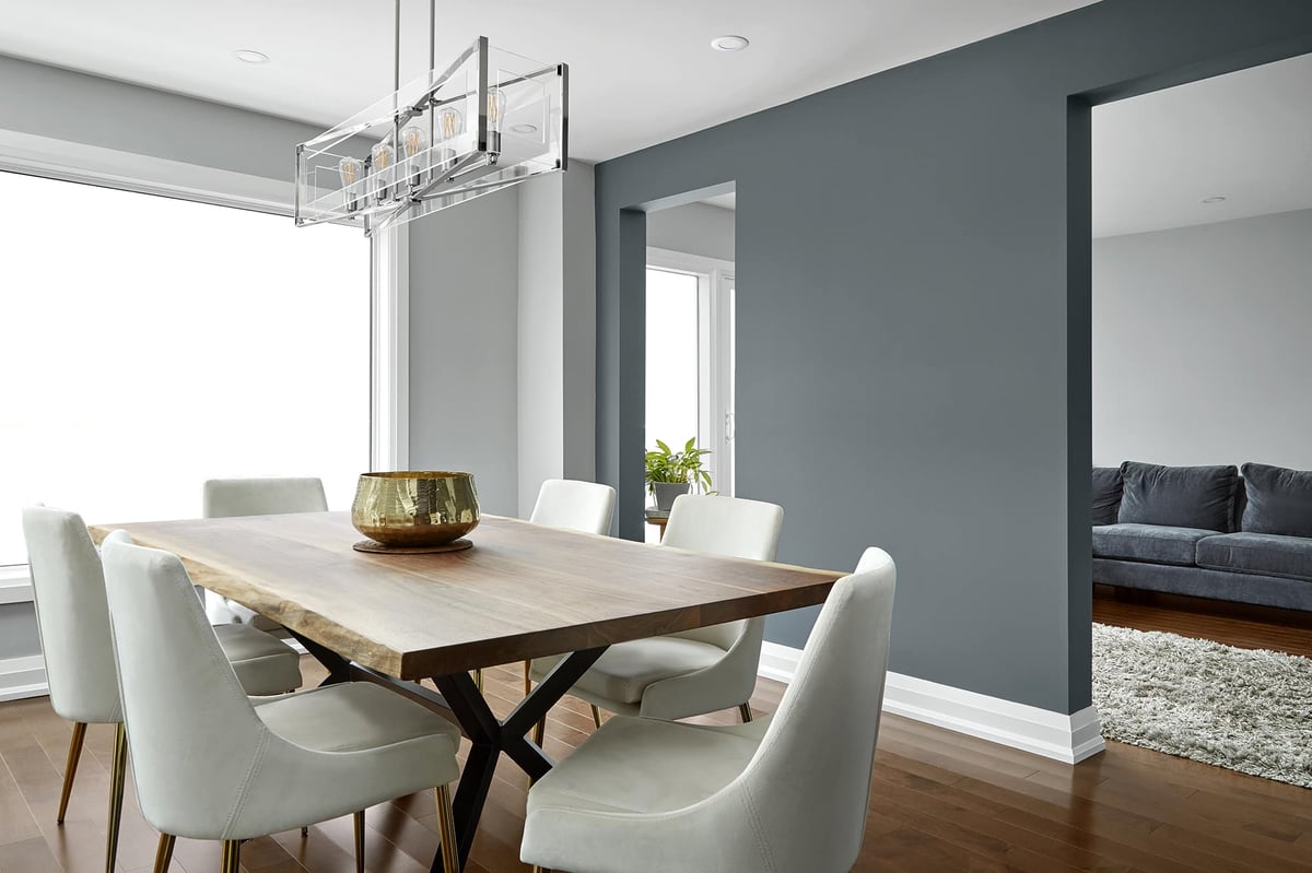 dining room renovation with pendant lighting and cozy chairs in markham ontario
