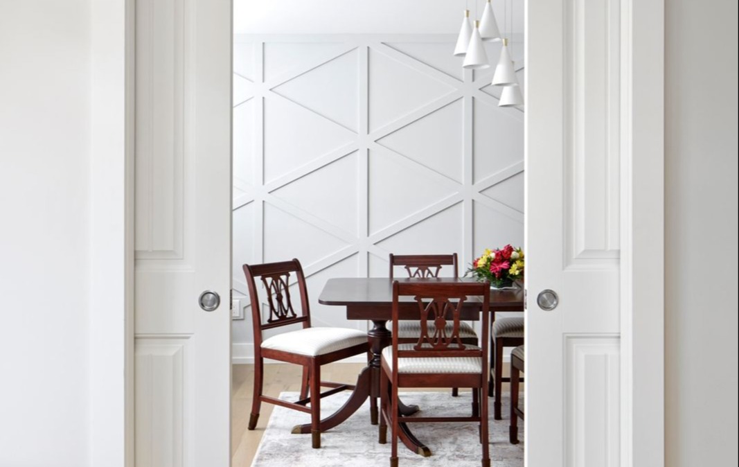 dual pocket doors looking into living room with a dimensional accent wall in markham-1