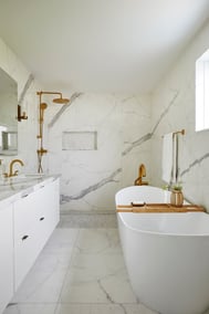 elegant marble bathroom renovation with brass faucets freestanding tub and all marble bathroom in markham