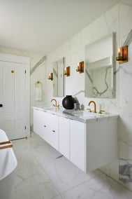 elegant marble bathroom renovation with floating vanity for his and hers brass faucets and all marble bathroom in markham2