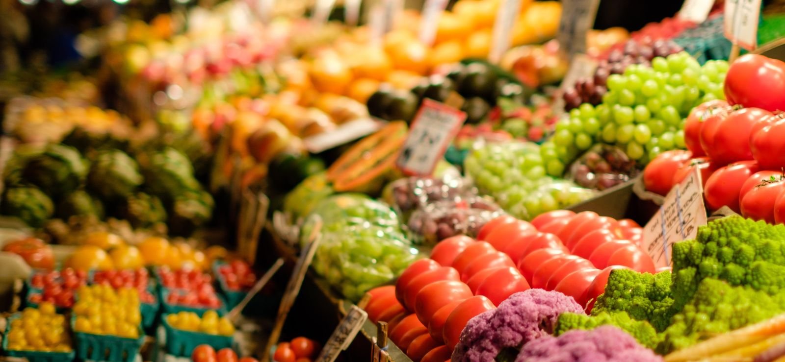 farmers market in markham ontario with a row of fruits and vegetables (1)
