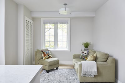 guest room with couch and rug in markham