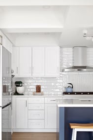 modern white kitchen cabinets with white tile backsplash in markham ontario