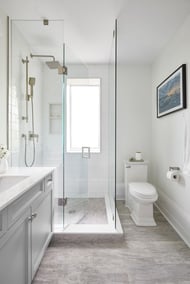 modern white markham bathroom renovation with glass pane shower