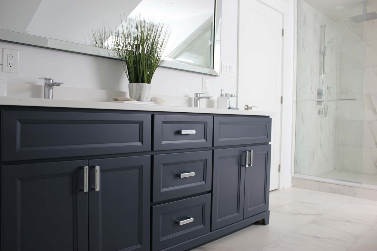 Navy bathroom vanity with double sinks