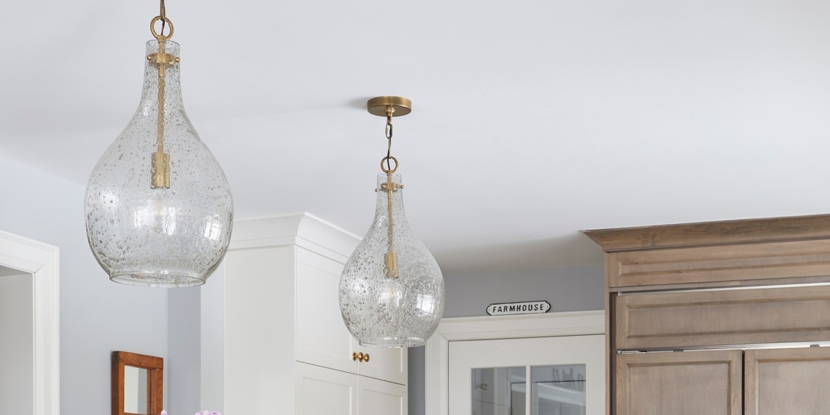 Pendant ceiling lighting with brass fixtures